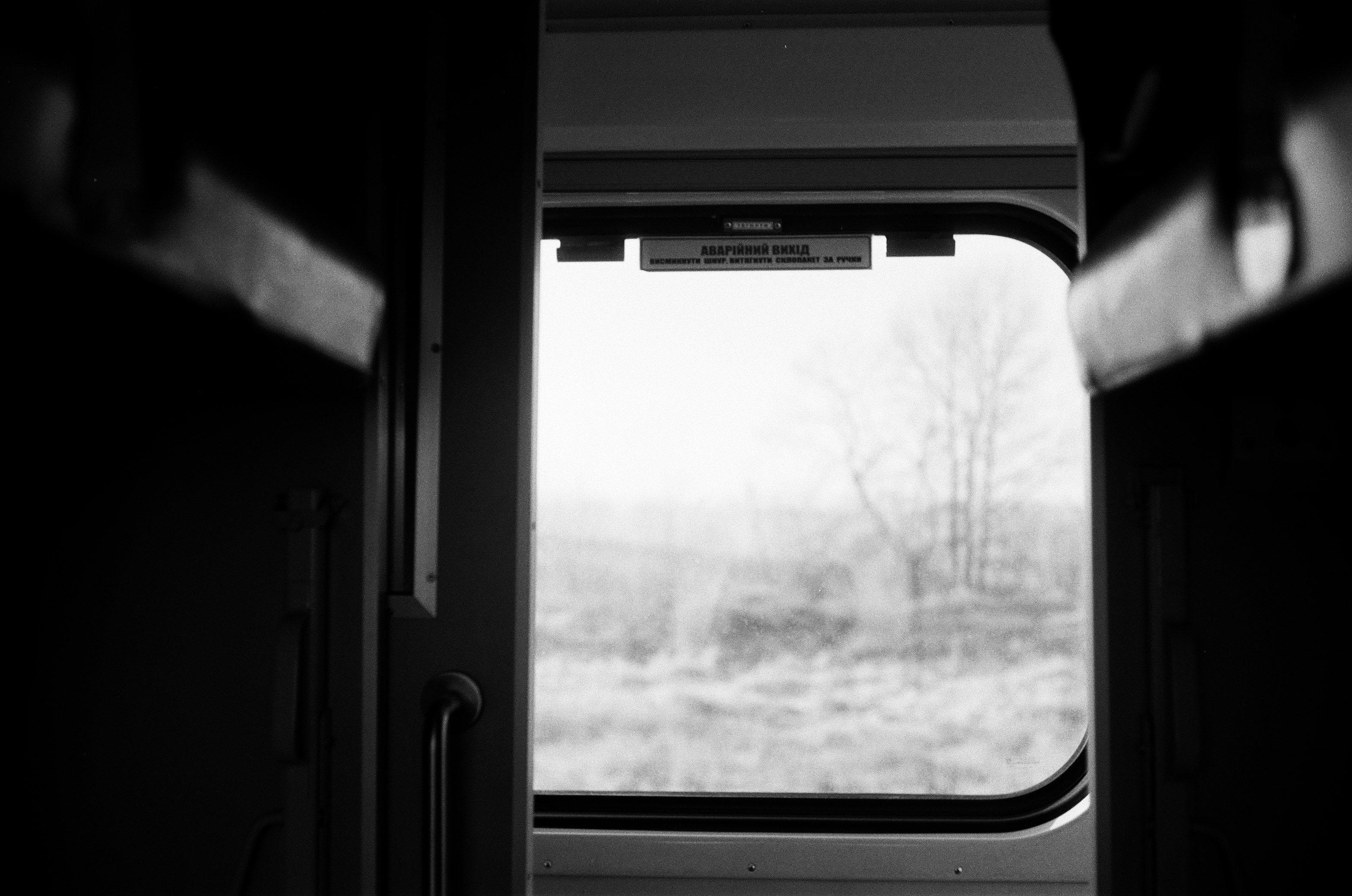 grayscale photo of a window